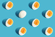 Difference pattern slice boiled eggs on blue background. Think different concept and business success idea