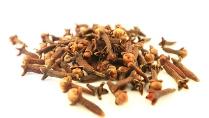 Wall Mural - Clove spice pile on white isolate