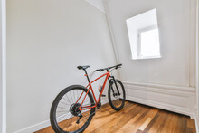 Red Bicycle In A Empty Room