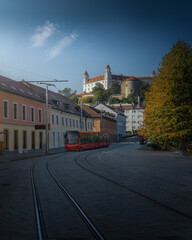 Sticker - Street with a red tram and Bratislava Castle on background - Bratislava, Slovakia