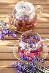 Sticker - Glass cup of lavender tea.