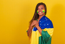 Black Woman Young Brazilian Soccer Fan. Using Flag, Singing Anthem Is Born.