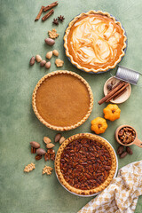 Wall Mural - Traditional fall Thanksgiving pies, pumpkin and pecan pie