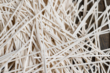 Rice pasta on a table and a wooden board