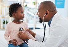 Pediatrician, Consulting And Stethoscope For Lungs Or Chest Checkup With Doctor In Medical Healthcare Hospital Or Clinic. Medicine, Young Patient And Black Man Therapist Listening To Heart Of Baby