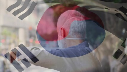 Poster - Animation of flag of south korea waving over caucasian man wearing face mask in city street