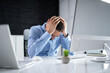 © Andrey Popov - Stressed Sick Employee Man