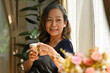 © saltdium - Happy old aged woman enjoy with afternoon tea or morning coffee, Domestic life concept.