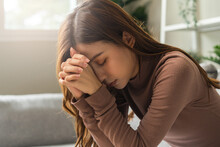 Believe Faith Charity, Calm Asian Young Woman Show Gratitude, Folded Hands In Prayer Feel Grateful, Meditating With Her Eyes Closed, Praying To Request God For Help. Religious, Forgiveness Concept.