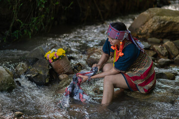 Wall Mural - Beautiful Asian young tribal lady in the native traditional dress culture of Karen people minority ethnic culture. Portraits of identity dress folk applying fashion concepts.