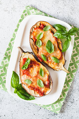 Wall Mural - baked eggplant with tomatoes and mozzarella and basil