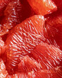 CLose-up of peeled red grapefruit segments