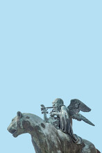 Cover Page With Statue Of A Panther With Genius Of Music, An Angel With Wings And A Harp, Stringed Musical Instrument At Concert Hall In Berlin, Germany, With Copy Space As Blue Sky Background.