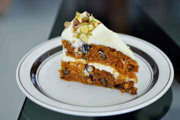 Wall Mural - carrot and raisin cake with pistachio topping , carrot cake