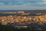 Fototapeta Na sufit - View of the city of Brno - Czech Republic - Europe. In the middle is the dominant Spilberk. The city is illuminated by the setting sun.
