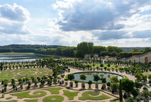 Beautiful Gardens Of The Palace Of Versailles With Trimmed Trees And Shrubs, Landscape Art Of France.