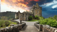 Eilean Donan Castle With At Dramatic Sunset, Scotland.