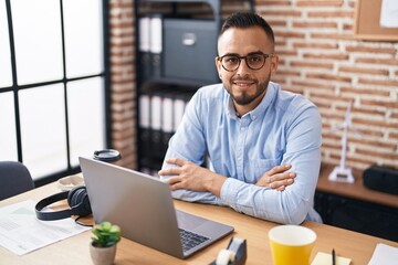 Sticker - Young hispanic man business worker using laptop working at office