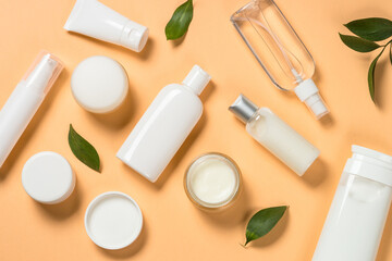 Poster - Natural cosmetic products. Serum bottles, cream, tonic and lotion for face and body care. Flat lay image.