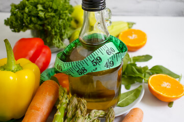 Wall Mural - Olive oil, measuring tape, fruits and vegetables