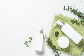 Fototapete - Natural cosmetic, skincare product. Eucalyptus cosmetic, spa product at white table.