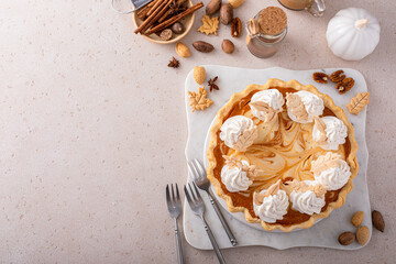 Wall Mural - Pumpkin cheesecake swirl pie topped with whipped cream