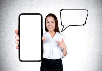 Poster - Businesswoman pointing at mockup large phone display, speech bubble