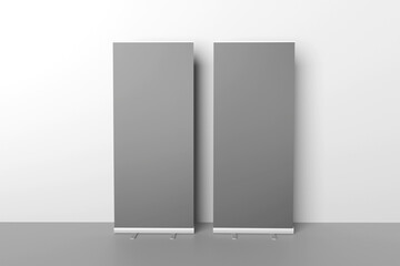 Wall Mural - Blank gray roll-up banner display mockup on light background, isolated, 3d rendering