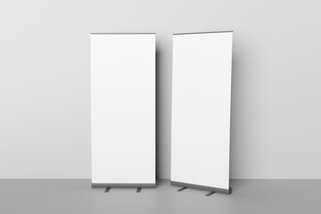 Wall Mural - Blank white roll-up banner display mockup on gray background, isolated, 3d rendering