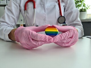 Health care lgbt and doctor holding lgbt badge