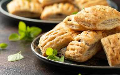 Wall Mural - Mini beef patties with vegetables and red wine wrapped in puff pastry