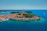 Fototapeta Mapy - Elevated view of Rovinj town in Croatia.  Islands can be seen in the background.