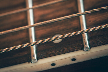 Wall Mural - Acoustic guitar neck, macro shot, guitar detail.