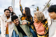 © Xavier Lorenzo - Happy group of young friends having fun in the city - Friendship and diverse people concept