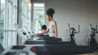 © Me studio - Healthy woman running on sports treadmill with daughter.Exercise for health and body health, to practice sports.children running on sports treadmill in gym.