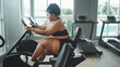 The right exercise for obese people.women exercise in the gym to stay healthy and lose fat.Health machines reduce fat and help burn calories.