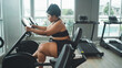 © Me studio - The right exercise for obese people.women exercise in the gym to stay healthy and lose fat.Health machines reduce fat and help burn calories.
