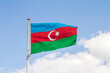 Azerbaijan flag is isolated on the blue sky