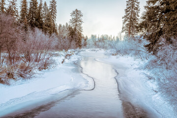 Wall Mural - Whitefish River, Montana on a frigid winter morning