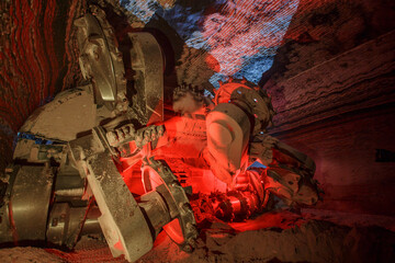 Wall Mural - Drilling machine in deep salt mine.