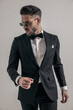 © Viorel Sima - attractive young man in black tuxedo posing in a fashion way