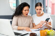 © JackF - Upset young couple managing finances, reading papers and checking data on laptop