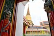 The entrance with an image of watchman in Wat Ratchabophit, The temple was built during the reign of King Chulalongkorn (Rama V).