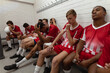 Rugby team resting in the locker room