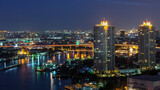 Fototapeta Nowy Jork - Bangkok Transportation with Modern Business Building along the river (Thailand)