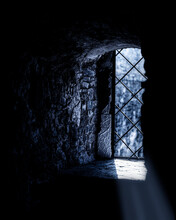 Rays Of Moonlight Break Through The Narrow Window Of The Old Castle.