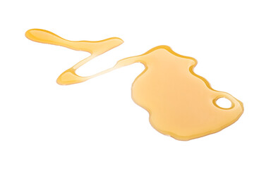 spilled maple syrup isolated on white background