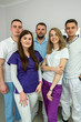 © RomanR - Portrait of five dentist at modern clinic