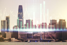Multi Exposure Of Virtual Creative Financial Chart Hologram On San Francisco Skyscrapers Background, Research And Analytics Concept