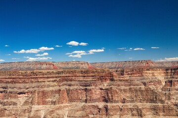 Sticker - Landscape of Grand Canyon National Park with rocky hills on the background of blue sky